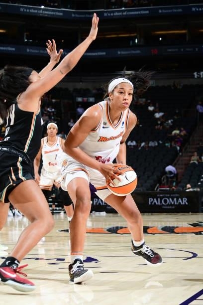 Megan Walker of the Phoenix Mercury drives to the basket against the New York Liberty on June 13, 2021 at Phoenix Suns Arena in Phoenix, Arizona....