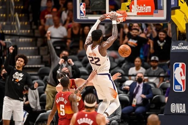 Deandre Ayton of the Phoenix Suns scores on a slam dunk against the Denver Nuggets in Game Four of the Western Conference second-round playoff series...