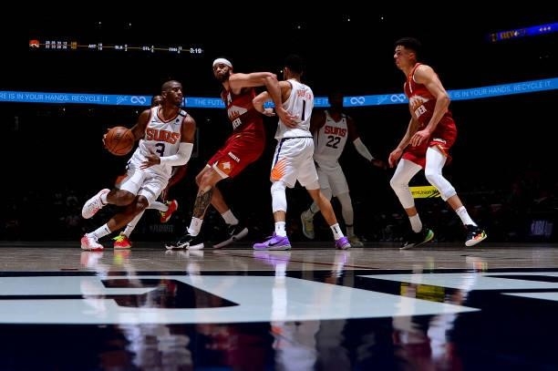 Chris Paul of the Phoenix Suns drives to the basket against the Denver Nuggets during Round 2, Game 4 of the 2021 NBA Playoffs on June 13, 2021 at...