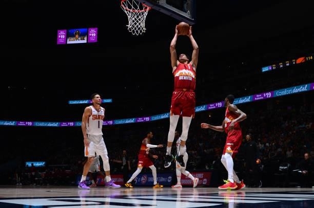 Michael Porter Jr. #1 of the Denver Nuggets rebounds the ball against the Phoenix Suns during Round 2, Game 4 of the 2021 NBA Playoffs on June 13,...