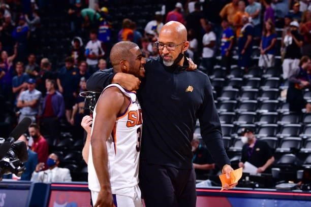 Head Coach Monty Williams of the Phoenix Suns hugs Chris Paul after the game against the Denver Nuggets during Round 2, Game 4 of the 2021 NBA...