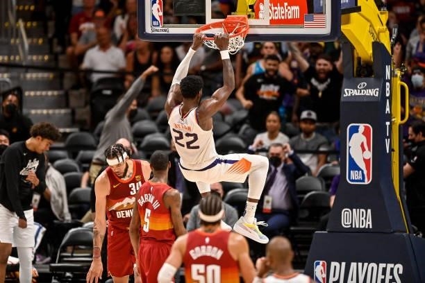 Deandre Ayton of the Phoenix Suns scores on a slam dunk against the Denver Nuggets in Game Four of the Western Conference second-round playoff series...
