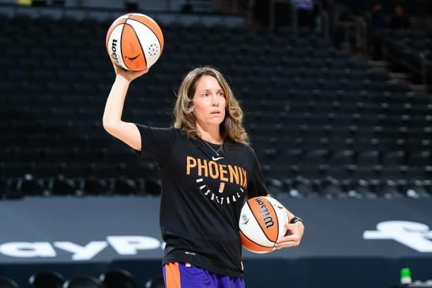 Assistant Coach, Julie Hairgrove of the Phoenix Mercury helps the team warm up before the game against the New York Liberty on June 13, 2021 at...