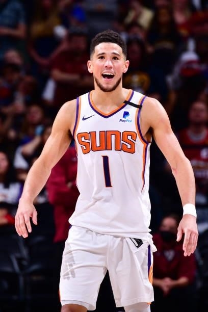 Devin Booker of the Phoenix Suns smiles during Round 2, Game 4 of the 2021 NBA Playoffs on June 13, 2021 at the Ball Arena in Denver, Colorado. NOTE...