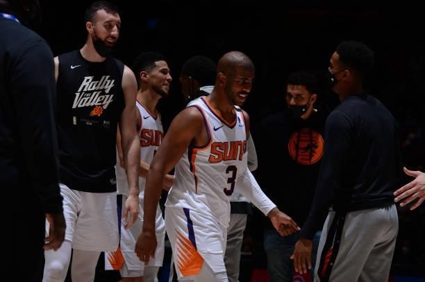 Chris Paul of the Phoenix Suns looks on against the Denver Nuggets during Round 2, Game 4 of the 2021 NBA Playoffs on June 13, 2021 at the Ball Arena...