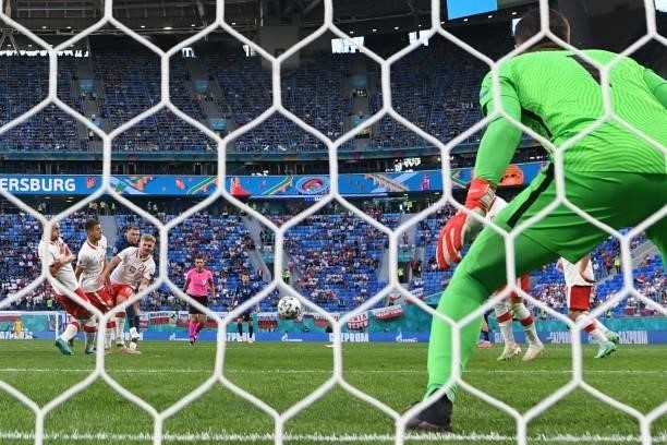Slovakia's defender Milan Skriniar shoots and scores his team's second goal during the UEFA EURO 2020 Group E football match between Poland and...