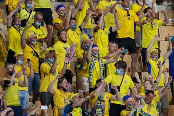 Sweden's football fans react after the final whistle of the UEFA EURO 2020 Group E football match between Spain and Sweden at La Cartuja Stadium in...