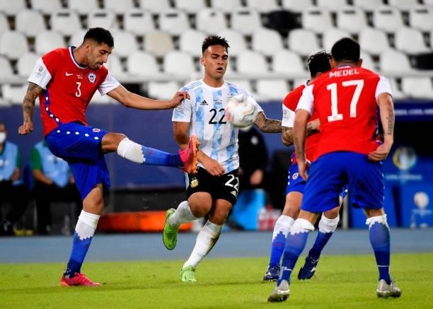 Guillermo Maripan of Chile competes for the ball with Lautaro Martinez of Argentina ,during the match between Argentina and Chile as part of Conmebol...