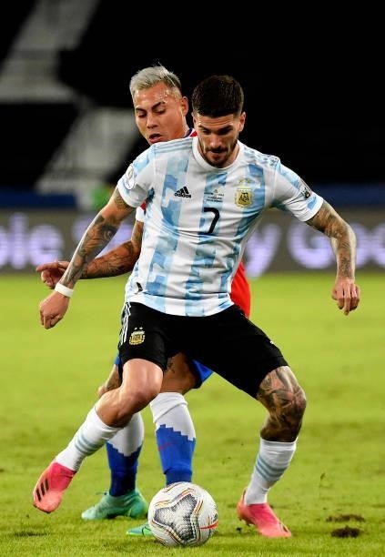 Rodrigo De Paul of Argentina competes for the ball with Eduardo Vargas of Chile ,during the match between Argentina and Chile as part of Conmebol...