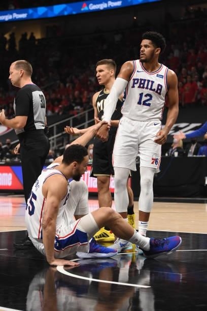 Tobias Harris of the Philadelphia 76ers helps up Ben Simmons of the Philadelphia 76ers during Round 2, Game 4 of the Eastern Conference Playoffs on...