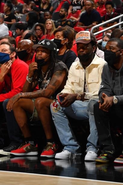 Rappers, Quavo and Offset attend a game between the Philadelphia 76ers and the Atlanta Hawks during Round 2, Game 4 of the Eastern Conference...