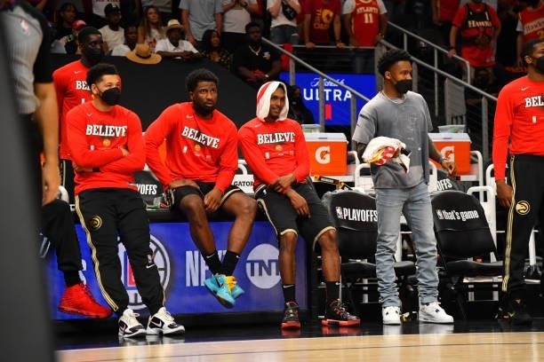 Solomon Hill of the Atlanta Hawks, Lou Williams of the Atlanta Hawks, and Brandon Goodwin of the Atlanta Hawks react during Round 2, Game 4 of the...
