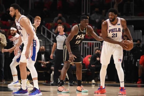 Joel Embiid of the Philadelphia 76ers handles the ball against Clint Capela of the Atlanta Hawks during Round 2, Game 4 of the Eastern Conference...