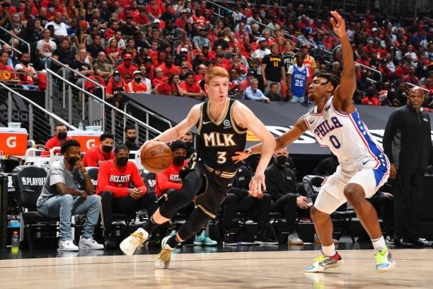 Kevin Huerter of the Atlanta Hawks handles the ball against Tyrese Maxey of the Philadelphia 76ers during Round 2, Game 4 of the Eastern Conference...