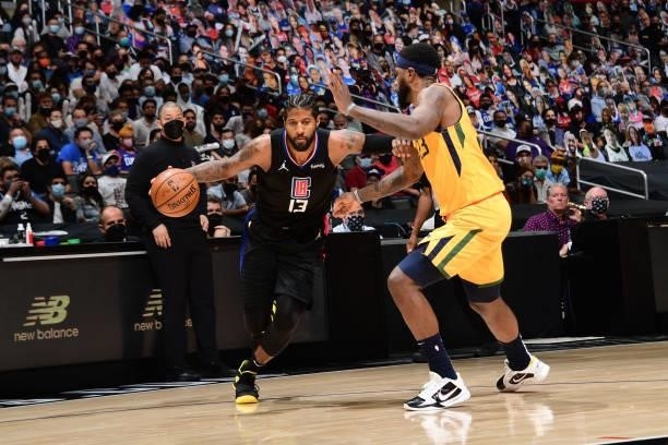 Paul George of the LA Clippers dribbles the ball during Round 2, Game 4 of 2021 NBA Playoffs on June 14, 2021 at STAPLES Center in Los Angeles,...