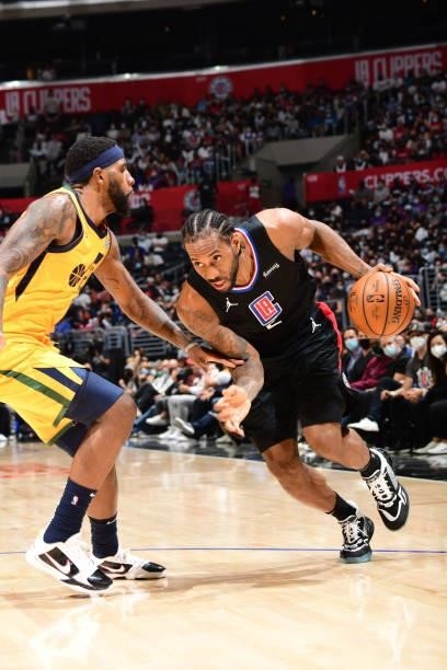 Kawhi Leonard of the LA Clippers dribbles the ball during Round 2, Game 4 of 2021 NBA Playoffs on June 14, 2021 at STAPLES Center in Los Angeles,...