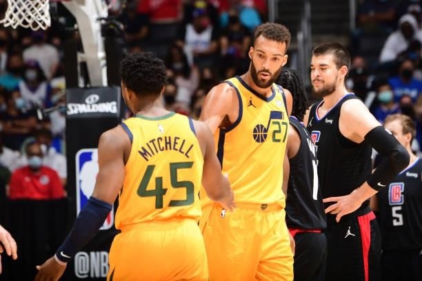 Rudy Gobert hi-fives Donovan Mitchell of the Utah Jazz during Round 2, Game 4 of 2021 NBA Playoffs on June 14, 2021 at STAPLES Center in Los Angeles,...