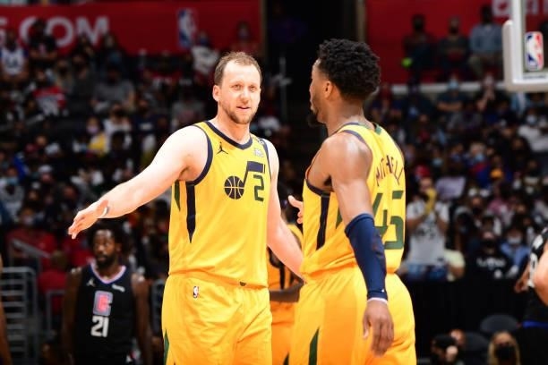 Joe Ingles hi-fives Donovan Mitchell of the Utah Jazz during Round 2, Game 4 of 2021 NBA Playoffs on June 14, 2021 at STAPLES Center in Los Angeles,...