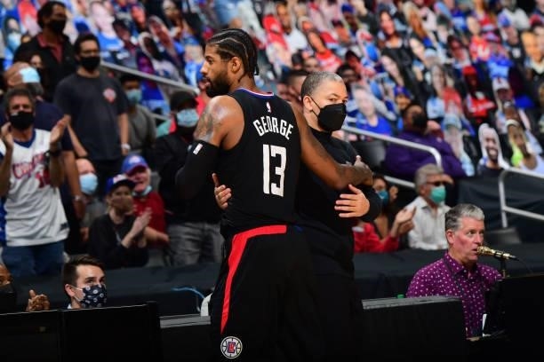 Head Coach Tyronn Lue of the Los Angeles Clippers hi-fives Paul George of the LA Clippers during Round 2, Game 4 of 2021 NBA Playoffs on June 14,...