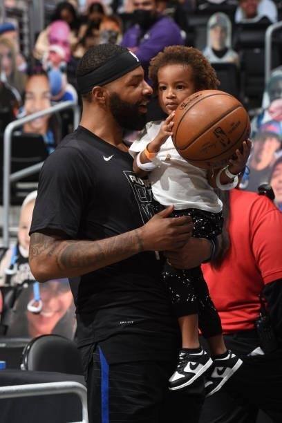 Marcus Morris Sr. #8 of the LA Clippers with his child after the game against the Utah Jazz during Round 2, Game 4 of 2021 NBA Playoffs on June 14,...
