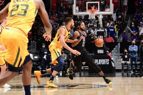 Rudy Gobert of the Utah Jazz plays defense on Paul George of the LA Clippers during Round 2, Game 4 of 2021 NBA Playoffs on June 14, 2021 at STAPLES...