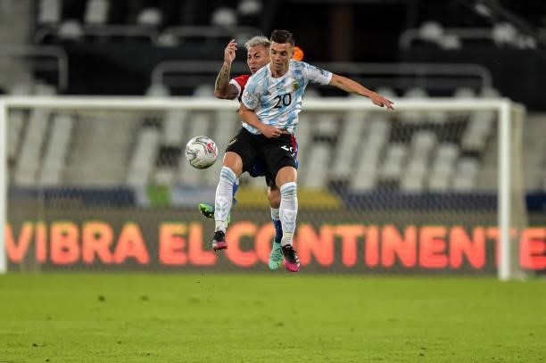 Lo Celso player from Argentina disputes a bid with Vargas player from Chile during a match at the Engenhão stadium for the Copa América 2021, on June...