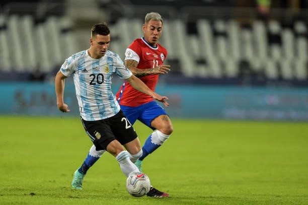 Lo Celso player from Argentina disputes a bid with Vargas player from Chile during a match at the Engenhão stadium for the Copa América 2021, on June...