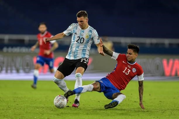 Lo Celso player from Argentina disputes a bid with Pulgar player from Chile during a match at the Engenhão stadium for the Copa América 2021, on June...