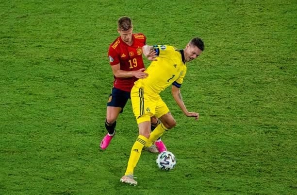 Dani Olmo and Mikael Lustig during the match between Spain and Sweden, corresponding to the Euro 2020, Group E, played at the La Cartuja Stadium, on...
