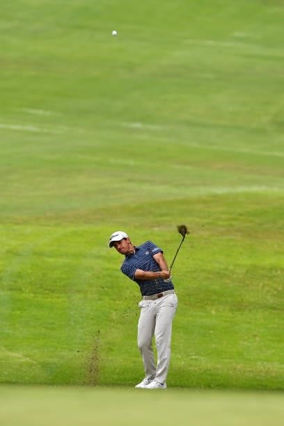 Matteo Manassero of Italy plays his third shot on the eighth hole during Day One of the Challenge de Espana at Iberostar Real Club de Golf Novo...