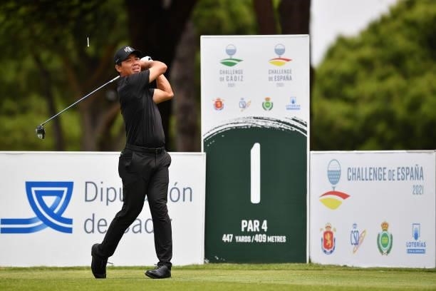 Ashun Wu of China tees off on the first hole during Day One of the Challenge de Espana at Iberostar Real Club de Golf Novo Sancti Petri on June 15,...