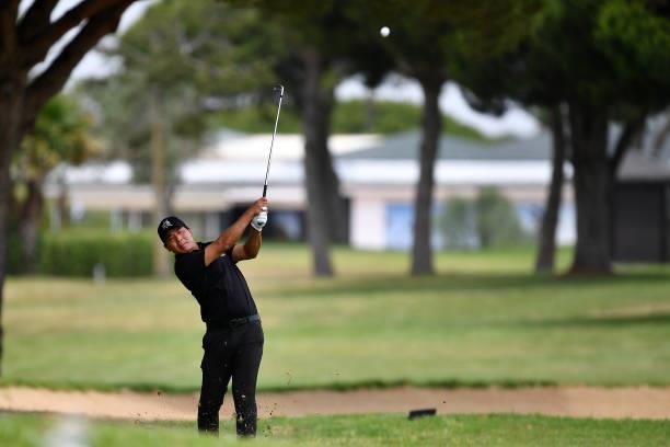 Ashun Wu of China plays his second shoot on the first hole during Day One of the Challenge de Espana at Iberostar Real Club de Golf Novo Sancti Petri...