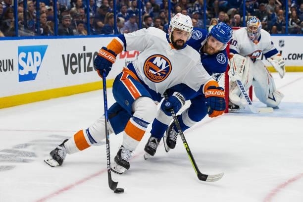Blake Coleman of the Tampa Bay Lightning skates against Nick Leddy of the New York Islanders during the first period in Game Two of the Stanley Cup...
