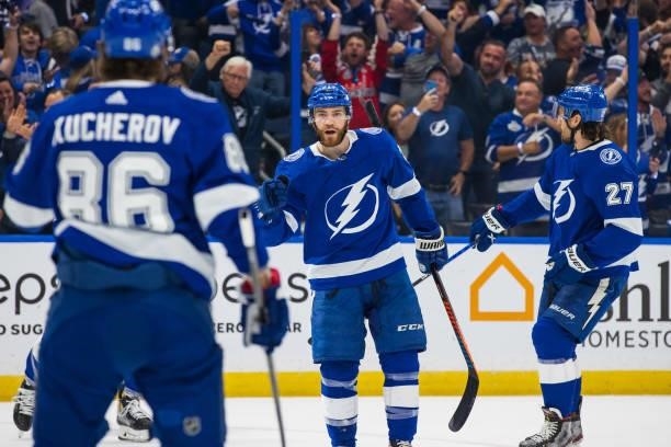 Brayden Point of the Tampa Bay Lightning celebrates a goal with teammate Nikita Kucherov against the New York Islanders during the first period in...