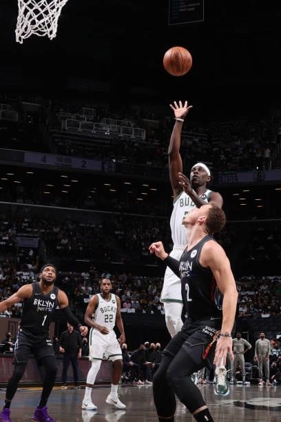 Jrue Holiday of the Milwaukee Bucks shoots the ball against the Brooklyn Nets during Round 2, Game 5 of the 2021 NBA Playoffs on June 15, 2021 at...
