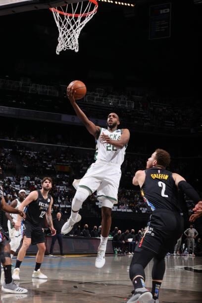 Khris Middleton of the Milwaukee Bucks drives to the basket against the Brooklyn Nets during Round 2, Game 5 of the 2021 NBA Playoffs on June 15,...