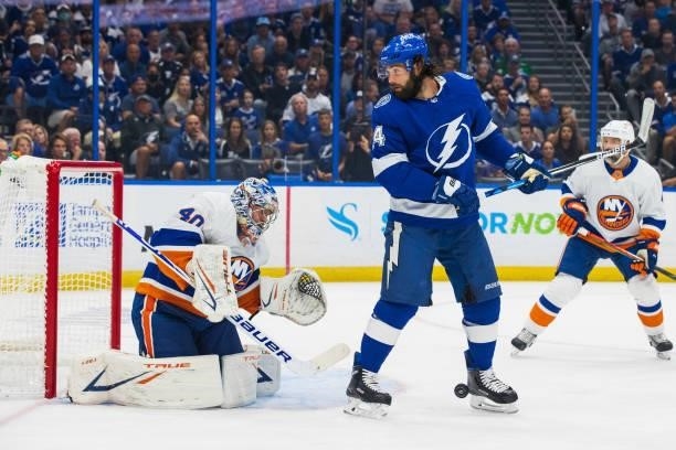 Pat Maroon of the Tampa Bay Lightning looks for the puck against goalie Semyon Varlamov of the New York Islanders during the first period in Game Two...