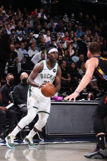 Jrue Holiday of the Milwaukee Bucks shoots a three point basket against the Brooklyn Nets during Round 2, Game 5 of the 2021 NBA Playoffs on June 15,...