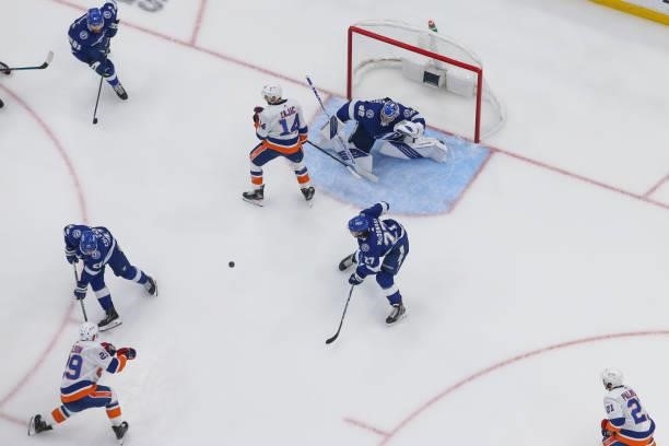 Goalie Andrei Vasilevskiy of the Tampa Bay Lightning gives up a goal against Brock Nelson of the New York Islanders during the first period in Game...