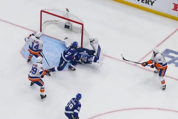 Goalie Andrei Vasilevskiy of the Tampa Bay Lightning dives to make a save against the New York Islanders during the first period in Game Two of the...