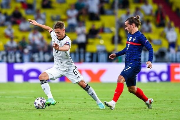 Joshua KIMMICH of Germany and Antoine GRIEZMANN of France during the UEFA European Championship football match between France and Allemagne at...