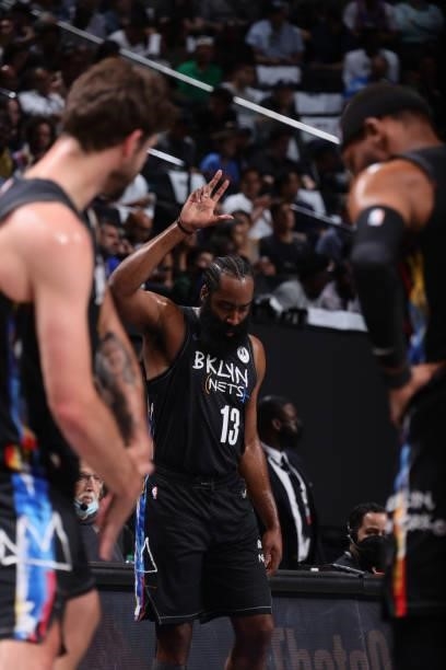 James Harden of the Brooklyn Nets waves to the fans before the game against the Milwaukee Bucks during Round 2, Game 5 of the 2021 NBA Playoffs on...