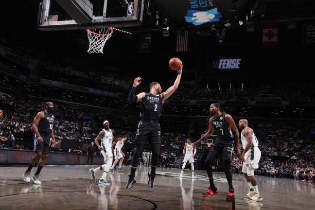 Blake Griffin of the Brooklyn Nets rebounds the ball against the Milwaukee Bucks during Round 2, Game 5 of the 2021 NBA Playoffs on June 15, 2021 at...