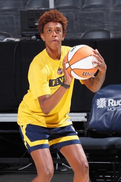Danielle Robinson of the Indiana Fever warms up before the game against the Seattle Storm on June 15, 2021 at Bankers Life Fieldhouse in...