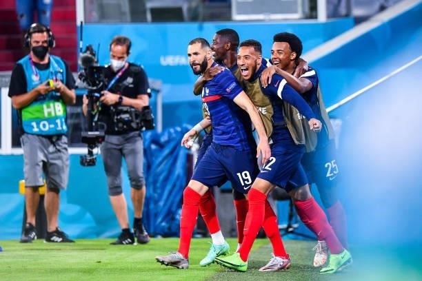 Karim BENZEMA of France celebrates his goal with team mates during the UEFA European Championship football match between France and Allemagne at...