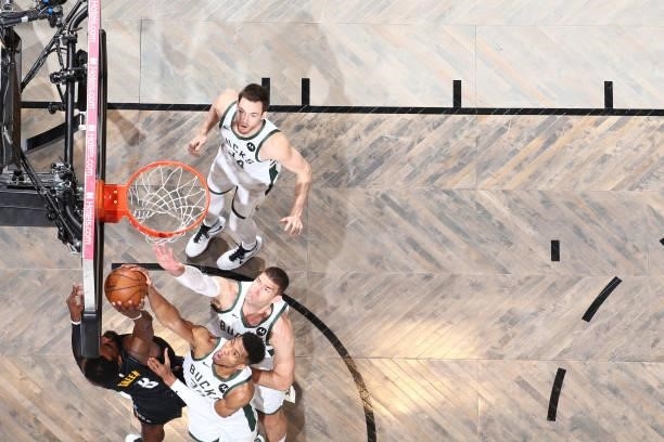Giannis Antetokounmpo of the Milwaukee Bucks blocks the shot of Jeff Green of the Brooklyn Nets during Round 2, Game 5 of the 2021 NBA Playoffs on...