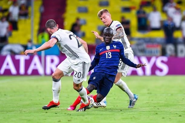 Robin GOSENS of Germany, N'Golo KANTE of France and Toni KROOS of Germany during the UEFA European Championship football match between France and...