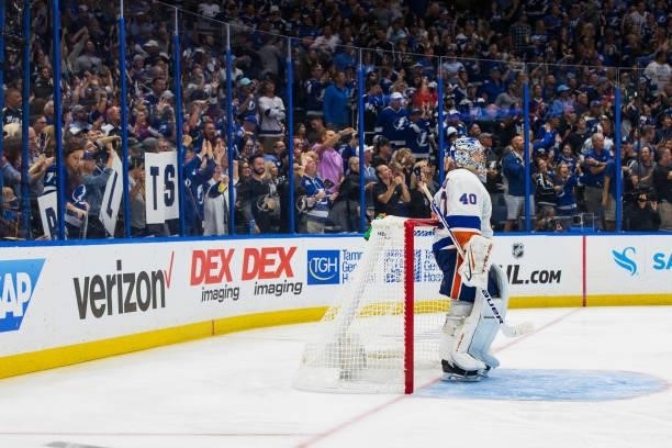 Fans of the Tampa Bay Lightning celebrate a goal against goalie Semyon Varlamov of the New York Islanders during the third period in Game Two of the...