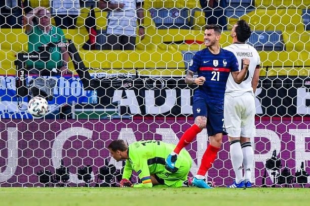 Lucas HERNANDEZ of France celebrates in front of Manuel NEUER of Germany and Mats HUMMELS of Germany during the UEFA European Championship football...