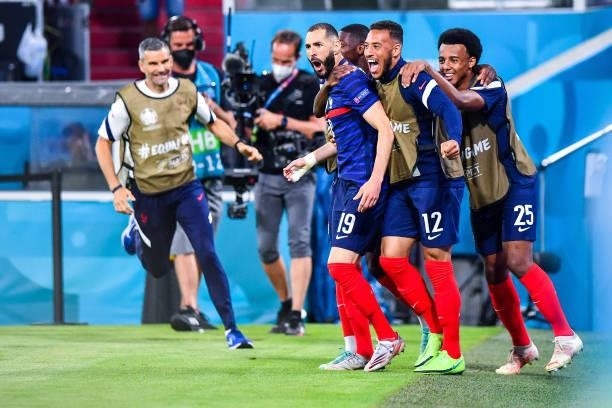 Karim BENZEMA of France celebrates his goal with team mates during the UEFA European Championship football match between France and Allemagne at...